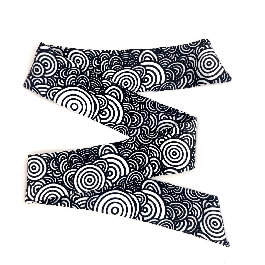 Black and white patterned Twilly on a white background